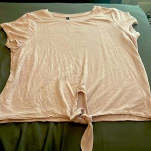 Pink atheleisure shirt ties in front